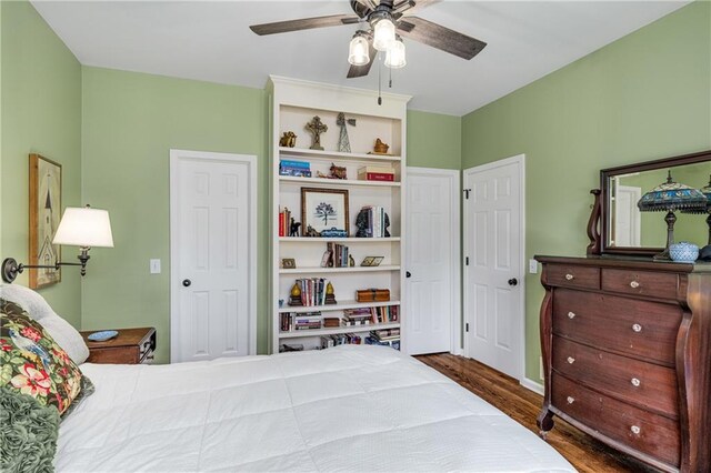 bedroom featuring wood finished floors and ceiling fan