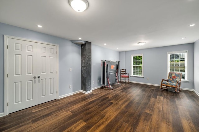 interior space with dark wood-style floors, baseboards, and recessed lighting