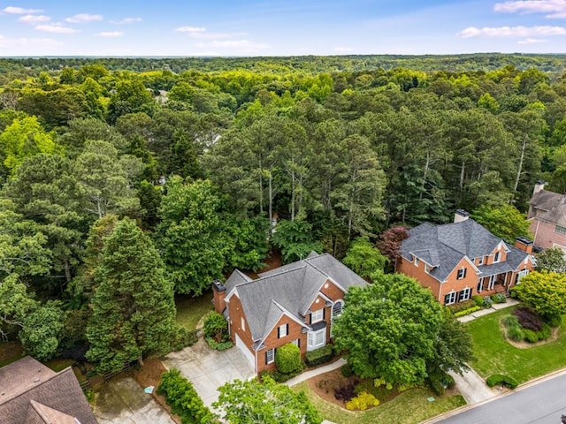 view from above of property featuring a forest