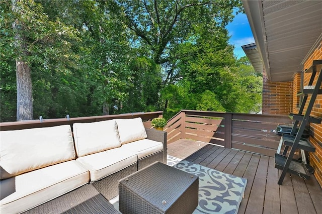 wooden deck featuring outdoor lounge area