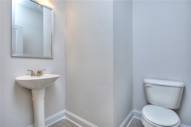 111 Ginger Trl, Homer, GA 30547 - bathroom featuring toilet, baseboards, and tile patterned flooring