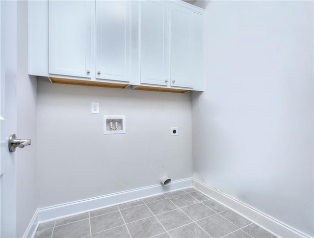 111 Ginger Trl, Homer, GA 30547 - laundry room with cabinet space, electric dryer hookup, baseboards, washer hookup, and light tile patterned floors