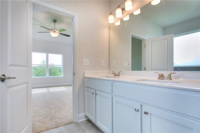 111 Ginger Trl, Homer, GA 30547 - full bathroom featuring double vanity, ceiling fan, tile patterned floors, and baseboards