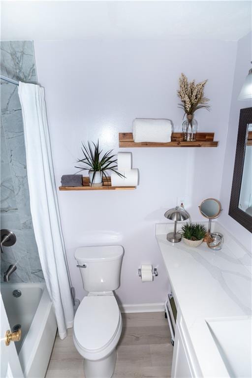 2706 Suwanee Way SE Unit 12, Marietta, GA 30067 - full bath with vanity, toilet, shower / tub combo, wood finished floors, and baseboards
