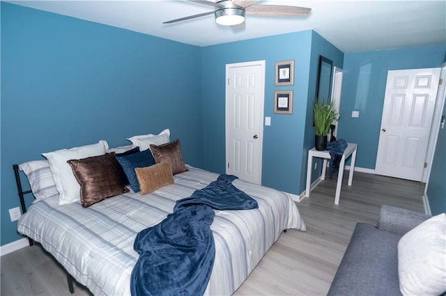 2706 Suwanee Way SE Unit 12, Marietta, GA 30067 - bedroom featuring light wood-style flooring, baseboards, and ceiling fan