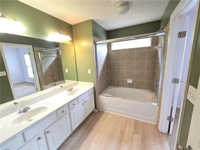3613 Tinsley Way SW, Atlanta, GA 30331 - full bathroom with wood finished floors, double vanity, and washtub / shower combination