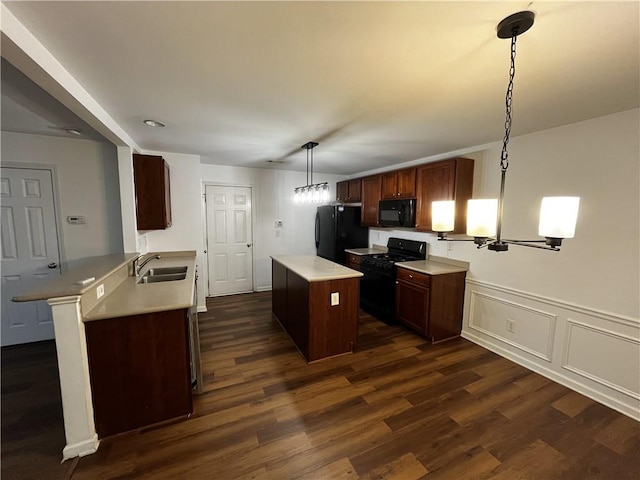 3613 Tinsley Way SW, Atlanta, GA 30331 - kitchen featuring black appliances, a sink, dark wood-type flooring, and light countertops