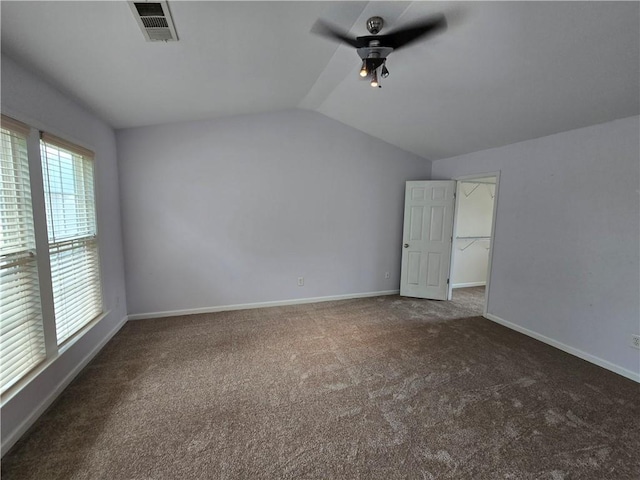 3613 Tinsley Way SW, Atlanta, GA 30331 - unfurnished bedroom featuring lofted ceiling, carpet floors, baseboards, a walk in closet, and a ceiling fan