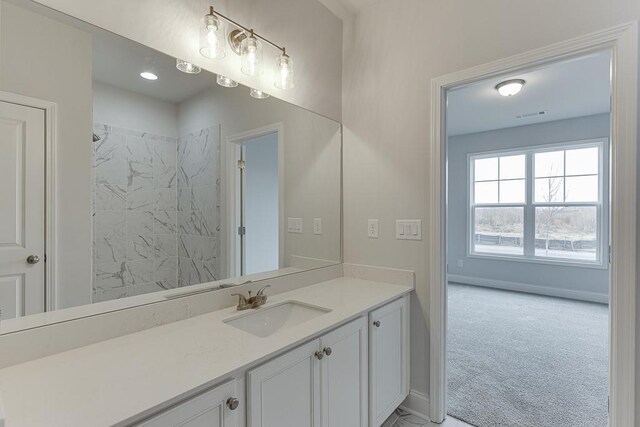199 Montview Dr, Jefferson, GA 30549 - bathroom with visible vents, baseboards, a shower, and vanity