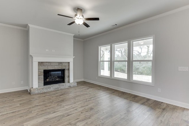 199 Montview Dr, Jefferson, GA 30549 - unfurnished living room featuring a stone fireplace, visible vents, light wood-style flooring, and baseboards