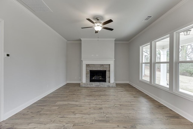 199 Montview Dr, Jefferson, GA 30549 - unfurnished living room with baseboards, light wood-style flooring, visible vents, and crown molding