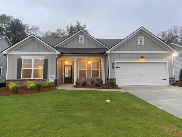 199 Montview Dr, Jefferson, GA 30549 - craftsman-style house with a garage, a shingled roof, concrete driveway, board and batten siding, and a front yard