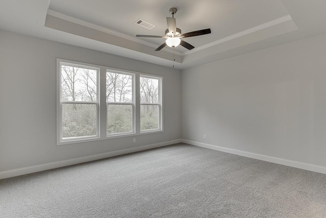 199 Montview Dr, Jefferson, GA 30549 - empty room featuring carpet floors, a tray ceiling, visible vents, ornamental molding, and baseboards