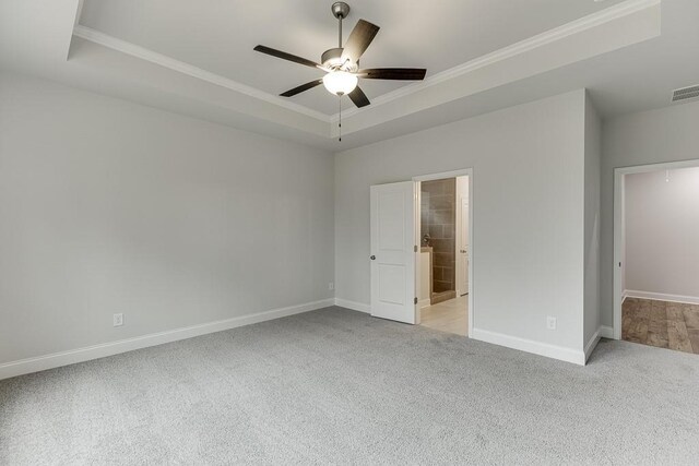 199 Montview Dr, Jefferson, GA 30549 - unfurnished bedroom with visible vents, baseboards, a raised ceiling, light colored carpet, and crown molding