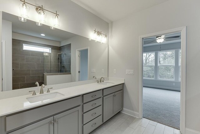 199 Montview Dr, Jefferson, GA 30549 - full bathroom with plenty of natural light, a sink, baseboards, and double vanity