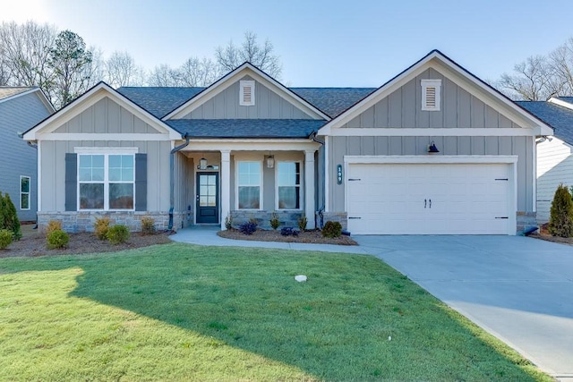 199 Montview Dr, Jefferson, GA 30549 - craftsman house with roof with shingles, board and batten siding, and stone siding