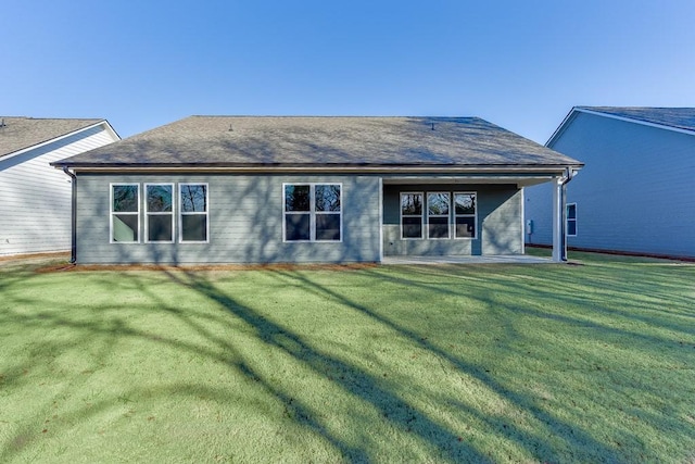 199 Montview Dr, Jefferson, GA 30549 - back of property with a shingled roof and a yard