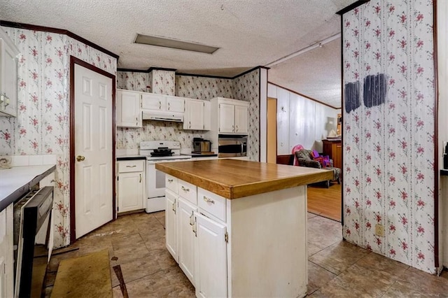 kitchen featuring white cabinets, a textured ceiling, white electric stove, and tile floors