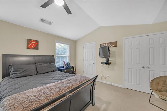 bedroom featuring lofted ceiling, visible vents, light carpet, ceiling fan, and baseboards