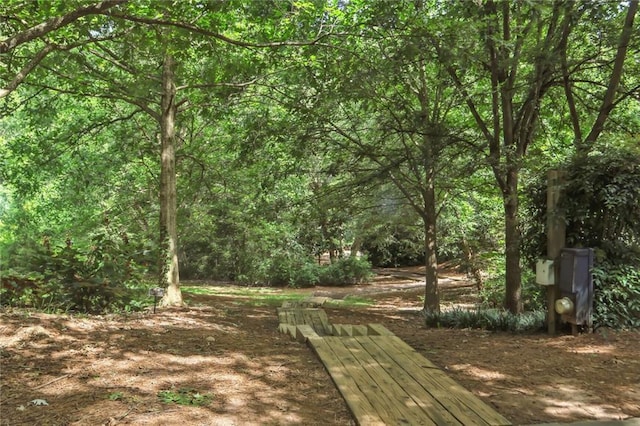 exterior space with a view of trees