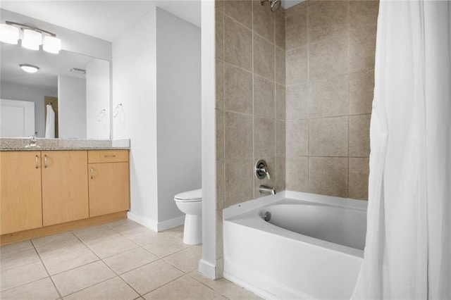860 Peachtree St NE Unit 909, Atlanta, GA 30308 - bathroom with toilet, tile patterned flooring, baseboards, shower / bathtub combination with curtain, and vanity