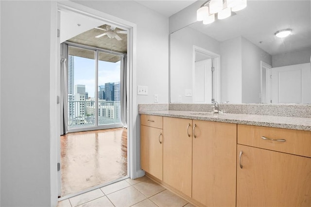 860 Peachtree St NE Unit 909, Atlanta, GA 30308 - bathroom featuring tile patterned flooring, vanity, and ceiling fan