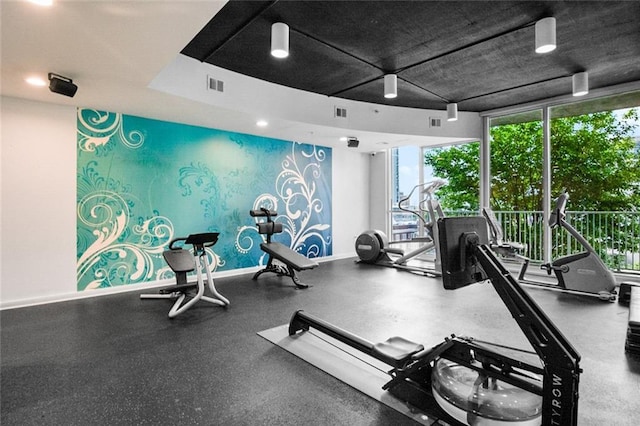 860 Peachtree St NE Unit 909, Atlanta, GA 30308 - exercise room with plenty of natural light, expansive windows, baseboards, and recessed lighting