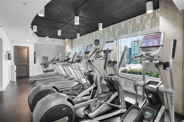 860 Peachtree St NE Unit 909, Atlanta, GA 30308 - workout area with wallpapered walls and baseboards