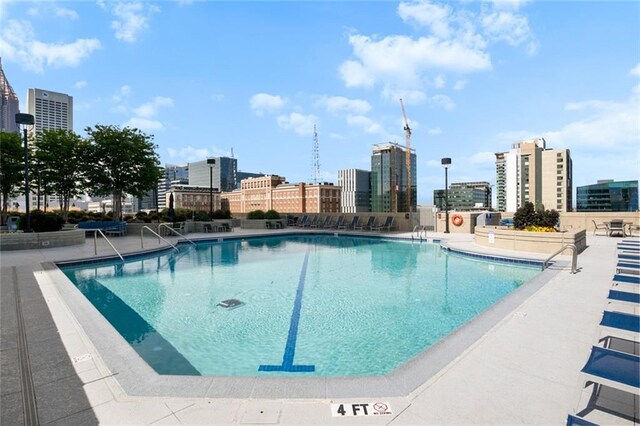 860 Peachtree St NE Unit 909, Atlanta, GA 30308 - community pool with a skyline view