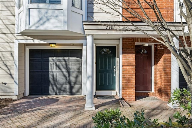 property entrance featuring a garage