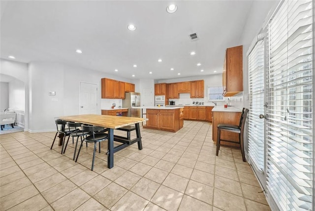 dining room with light tile patterned floors