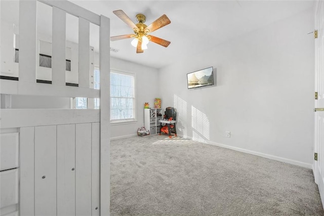 game room featuring ceiling fan and carpet floors