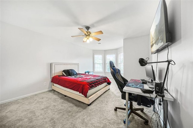 bedroom featuring ceiling fan and carpet floors