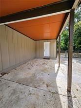 view of patio / terrace featuring a carport