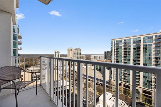 balcony featuring a city view