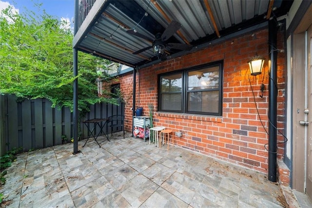 view of patio / terrace featuring ceiling fan