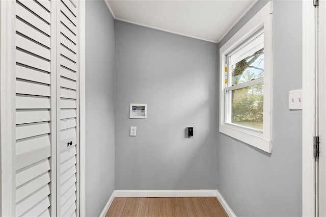 washroom featuring washer hookup, wood-type flooring, and electric dryer hookup