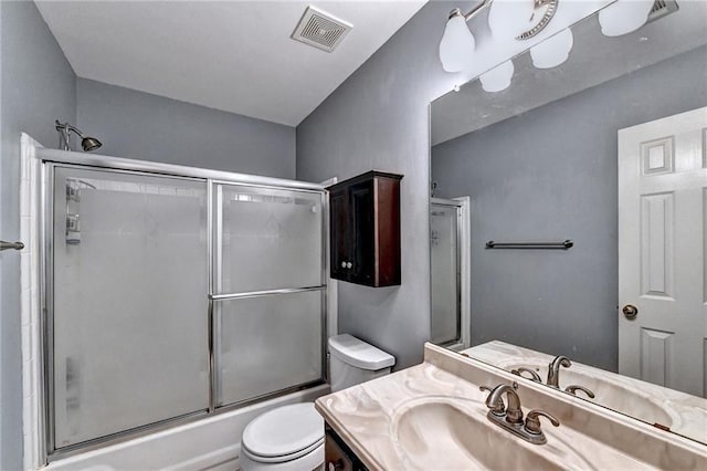 1595 Chadberry Way, Lawrenceville, GA 30043 - full bathroom featuring toilet, vanity, and combined bath / shower with glass door