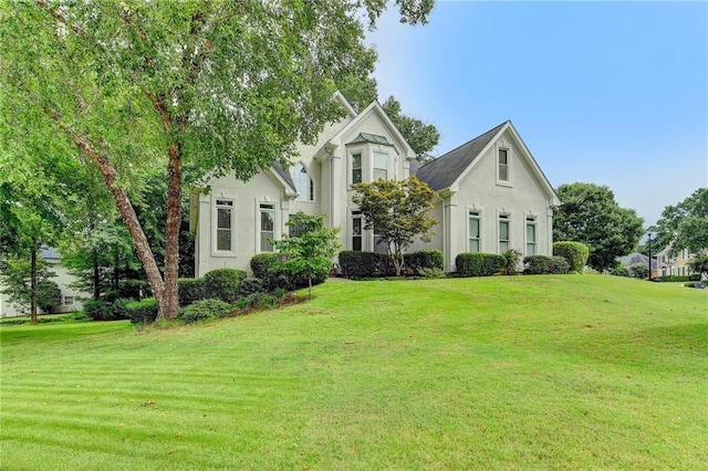 1595 Chadberry Way, Lawrenceville, GA 30043 - view of front of home with stucco siding and a front lawn