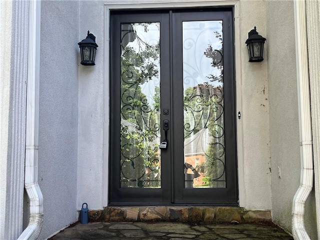 1595 Chadberry Way, Lawrenceville, GA 30043 - view of exterior entry with french doors and stucco siding