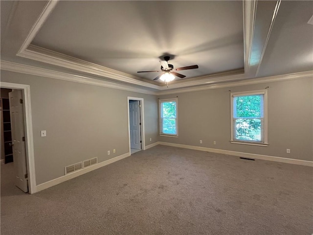 1595 Chadberry Way, Lawrenceville, GA 30043 - carpeted spare room featuring a tray ceiling, crown molding, ceiling fan, and baseboards