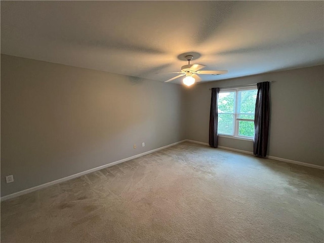 1595 Chadberry Way, Lawrenceville, GA 30043 - spare room with a ceiling fan, light colored carpet, and baseboards