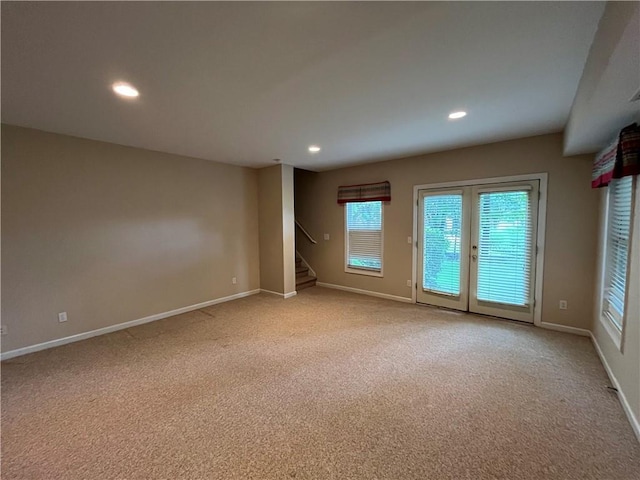 1595 Chadberry Way, Lawrenceville, GA 30043 - empty room with light colored carpet, recessed lighting, stairs, and baseboards
