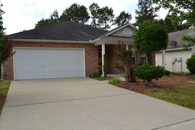 ranch-style house featuring a garage