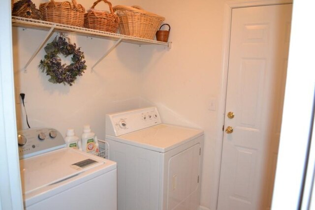 laundry area featuring washing machine and dryer