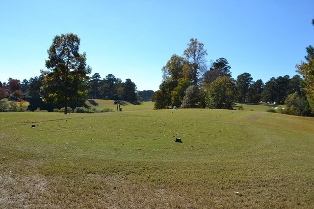 surrounding community with a lawn