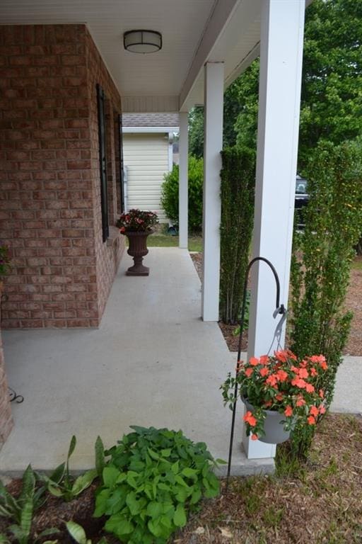 view of patio featuring a porch