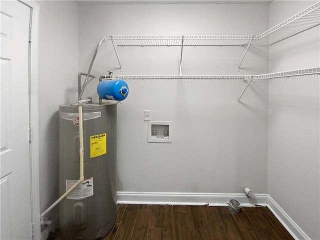 laundry area with water heater, dark hardwood / wood-style flooring, electric dryer hookup, and hookup for a washing machine