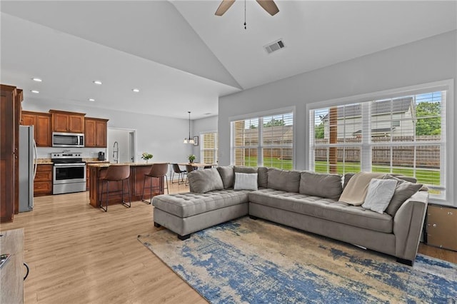 419 Highland Pointe Dr, Alto, GA 30510 - living room with a ceiling fan, healthy amount of natural light, light wood-style floors, recessed lighting, and high vaulted ceiling