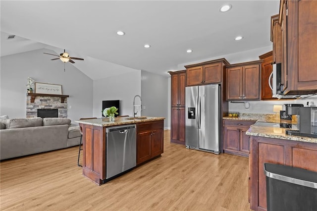 419 Highland Pointe Dr, Alto, GA 30510 - kitchen with appliances with stainless steel finishes, a sink, ceiling fan, light wood-style flooring, and open floor plan